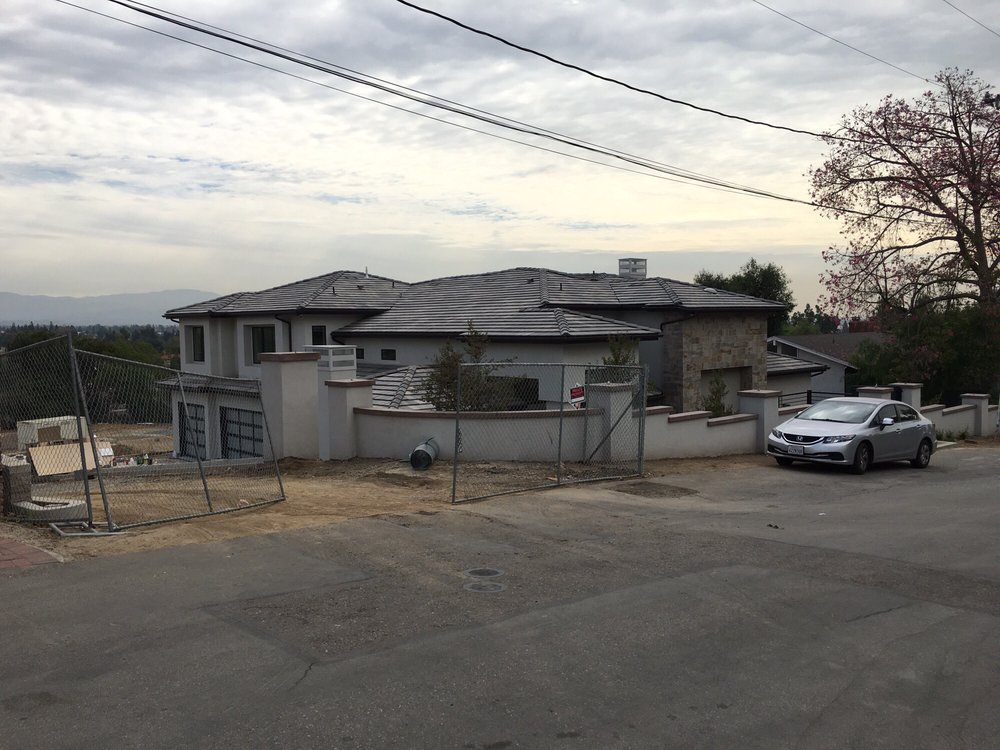 Slide of Mario's Roofing Services