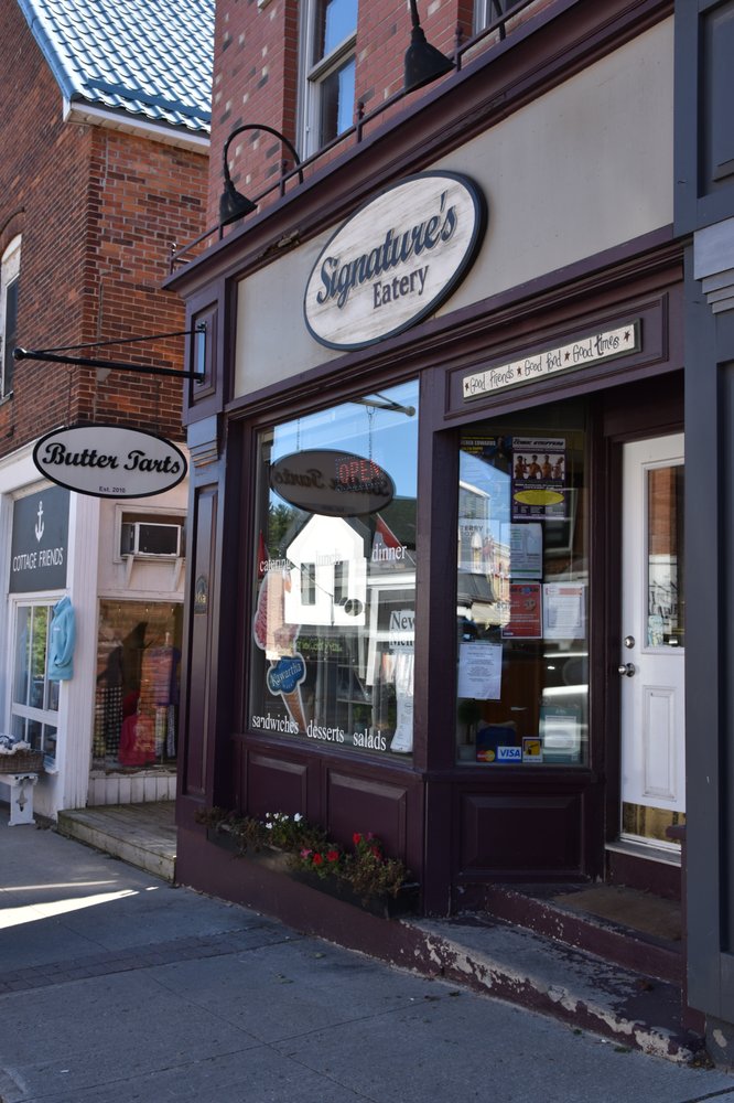 Signature's Eatery Logo