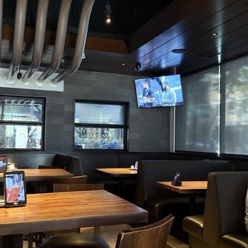 Yard House - TVs in every corner. Good seating too! - New American Near Me - Austin, Texas Yard House - TVs in every corner. Good seating too! - New American Near Me - Austin, Texas