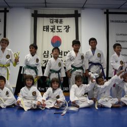 Jae H Kim Tae Kwon Do Institute - A group of our kids, excited after getting their new belt ranks!
