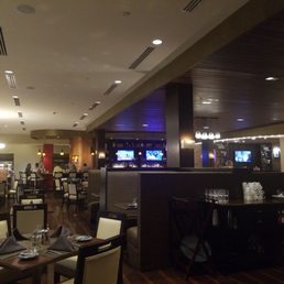 It was a quiet Tuesday in a hotel restaurant, bar was full. It was a quiet Tuesday in a hotel restaurant, bar was full.