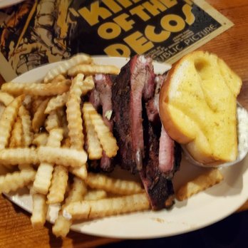 Shorty's BBQ - Spared ribs with fries and garlic bread - Southern Near Me - Miami, Florida Shorty's BBQ - Spared ribs with fries and garlic bread - Southern Near Me - Miami, Florida