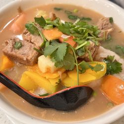Starlight Kitchen - Fish noodle soup with tomato and pumpkin fish soup, beef brisket and fish slices ($16.98)