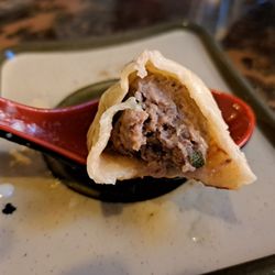 Inside Buuz, pan-fried Mongolian beef dumplings, which are larger than bansh. These are available daily.