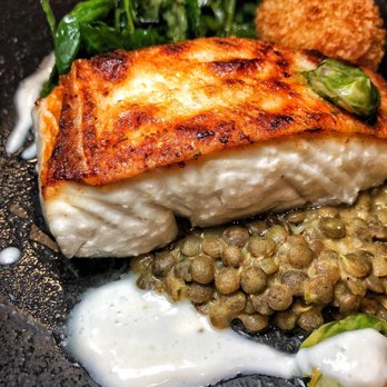 ROSÉLYS RESTAURANT - Atlantic halibut confit, Vicky's citrus butter, lentil, and clam croquette. - Bistros Near Me - Montreal, Quebec ROSÉLYS RESTAURANT - Atlantic halibut confit, Vicky's citrus butter, lentil, and clam croquette. - Bistros Near Me - Montreal, Quebec