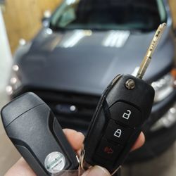 Sherlock's Locksmith - New Ford remote Decoded, cut & programmed.