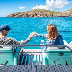 Epic Yacht Charters - Say cheers on the aft deck of your charter yacht vacation
