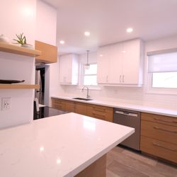 Livingston Cabinetry - White oak cabinets and high gloss white doors.