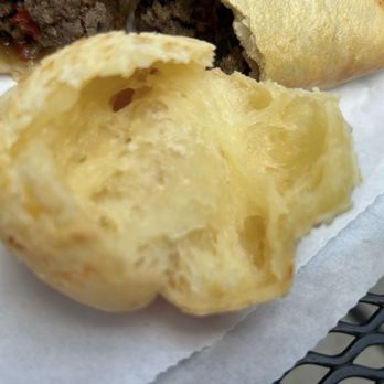 PiniPico Coffee & Empanadas - Cheese bread opened to see the cheese - Brazilian Near Me - Chicago, Illinois