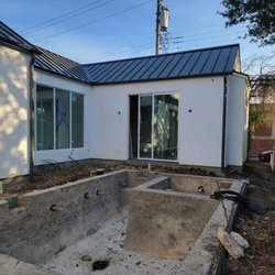 Gutter Rescue - 6" Tuxedo Gray seamless gutters with 4" round downspouts
