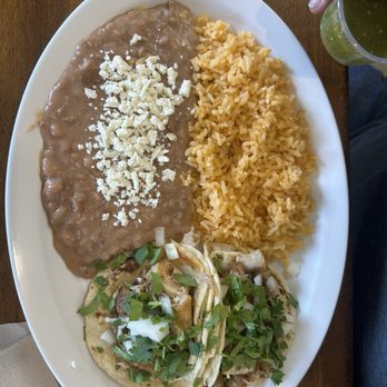 Taqueria Puebla - Carnitas street tacos, rice and beans - Mexican Near Me - Mukilteo, Washington