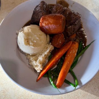 Nico's Pier 38 - My braised short ribs, with carrots, green beans, and mash. Tasty. - Seafood Near Me - Honolulu, Hawaii Nico's Pier 38 - My braised short ribs, with carrots, green beans, and mash. Tasty. - Seafood Near Me - Honolulu, Hawaii