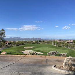 a view of a golf course a view of a golf course