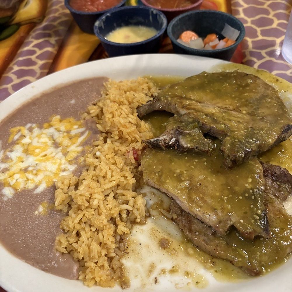 Pork chops with verde sauce.