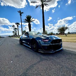 AZ Street Custom - 2019 for Mustang. They put a gt500 grill with 350 fenders and a carbon fiber hood. Changed the front lights. One of a kind.