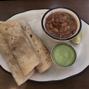 Superica - Tacos de carnitas with frijoles charros and chile verde. - Tex-Mex Near Me - Atlanta, Georgia Superica - Tacos de carnitas with frijoles charros and chile verde. - Tex-Mex Near Me - Atlanta, Georgia
