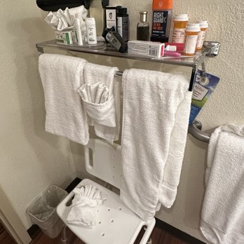 Baymont by Wyndham Corbin - The nonexistent shelf space in the bathroom. And a shower chair for some reason. - Hotels Near Me - Corbin, Kentucky Baymont by Wyndham Corbin - The nonexistent shelf space in the bathroom. And a shower chair for some reason. - Hotels Near Me - Corbin, Kentucky