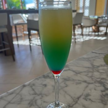 Sweet T's Travel Services - Bob Marley Mimosa - Travel Agents Near Me Sweet T's Travel Services - Bob Marley Mimosa - Travel Agents Near Me
