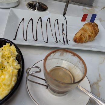 Vanilla Espresso French Café - Side of 2 eggs and mini croissant. - Themed Cafes Near Me - Miramar, Florida Vanilla Espresso French Café - Side of 2 eggs and mini croissant. - Themed Cafes Near Me - Miramar, Florida
