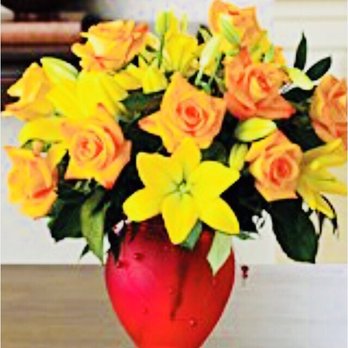Rainbow Flowers - What was ordered. A dozen roses & a dozen lilies. - Florists Near Me - Fresno, California