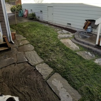 Van's Landscape - This was just completed today after days and days of rain, so the sod is a little mucky but the flagstone/masonry steps are expertly done. - Landscaping Near Me