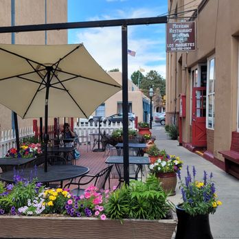 Los Magueyes Mexican Restaurant - a patio with tables and chairs - Mexican Near Me - Santa Fe, New Mexico
