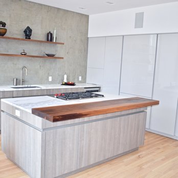 Home Evolutions - a modern kitchen with wood countertops - General Contractors Near Me - Port Jefferson, New York Home Evolutions - a modern kitchen with wood countertops - General Contractors Near Me - Port Jefferson, New York