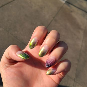 Sunset Nails - Black ombre with iridescent green chrome powder. Dark purple accent nail ombre with a spiderweb for Halloween by Ellen. - Nail Salons Near Me - San Francisco, California Sunset Nails - Black ombre with iridescent green chrome powder. Dark purple accent nail ombre with a spiderweb for Halloween by Ellen. - Nail Salons Near Me - San Francisco, California