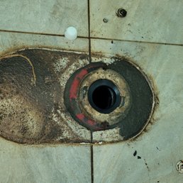 Removed the toilet to show the dirt where the seal needed to be replaced. Removed the toilet to show the dirt where the seal needed to be replaced.