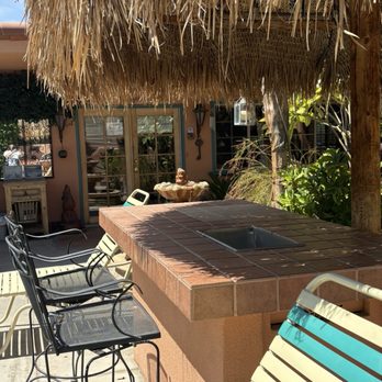 Coyote Inn - Bar area at Coyote Inn. Office is the double doors. Gas barbecue, ready for use, is to right of chaise. - Hotels Near Me - Palm Springs, California