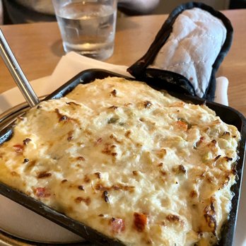Hot Tuna - Hot Chesapeake Crab Dip (close up). - Bars Near Me - Virginia Beach, Virginia Hot Tuna - Hot Chesapeake Crab Dip (close up). - Bars Near Me - Virginia Beach, Virginia