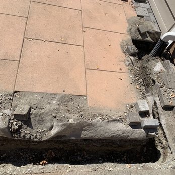 DVO Landscaping - Continuation of trench on back deck to house - Landscaping Near Me