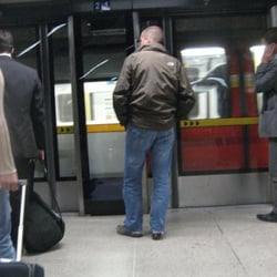 Docklands Light Rail - The Canary Wharf station has these nifty glass doors, I'm guessing to prevent businesspeople's suicide attempts?