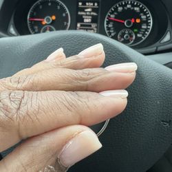Lucky Nails - Finished nails with crust around the edges and peeling polish.