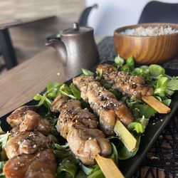 Sensations - Chicken teriyaki grilled perfectly on a bed of delicious fresh greens and white rice with sesame seeds.