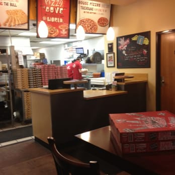 Toppers Pizza - pizza boxes on a table in a restaurant - Pizza Near Me - Eau Claire, Wisconsin Toppers Pizza - pizza boxes on a table in a restaurant - Pizza Near Me - Eau Claire, Wisconsin