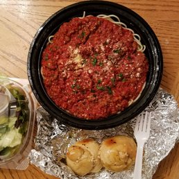 Spaghetti with meat sauce.  Comes with 2 garlic knots, and side salad.  Feeds about 4.