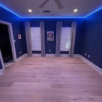 Pounds Floor & Tile - a room with a ceiling fan - Flooring Near Me - Austin, Texas Pounds Floor & Tile - a room with a ceiling fan - Flooring Near Me - Austin, Texas