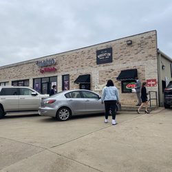 Walk up windows in front, entrance on the right side. Look out for cars in the driver thru.