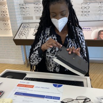 For Eyes - Cleaning the machine before I was measured for my glasses. All staff was wearing masks. - Optometrists Near Me - Weston, Florida For Eyes - Cleaning the machine before I was measured for my glasses. All staff was wearing masks. - Optometrists Near Me - Weston, Florida
