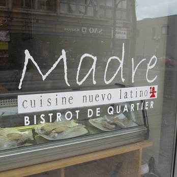 Restaurant Madre - a display of pastries in a glass case - Latin American Near Me - Montreal, Quebec Restaurant Madre - a display of pastries in a glass case - Latin American Near Me - Montreal, Quebec