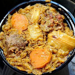 Canzy Island Taste - Legume. Haitian stew with cabbage, eggplant, chayote, spinach, and other veg, with pork sholder, goat, etc. Savory & very tasty.