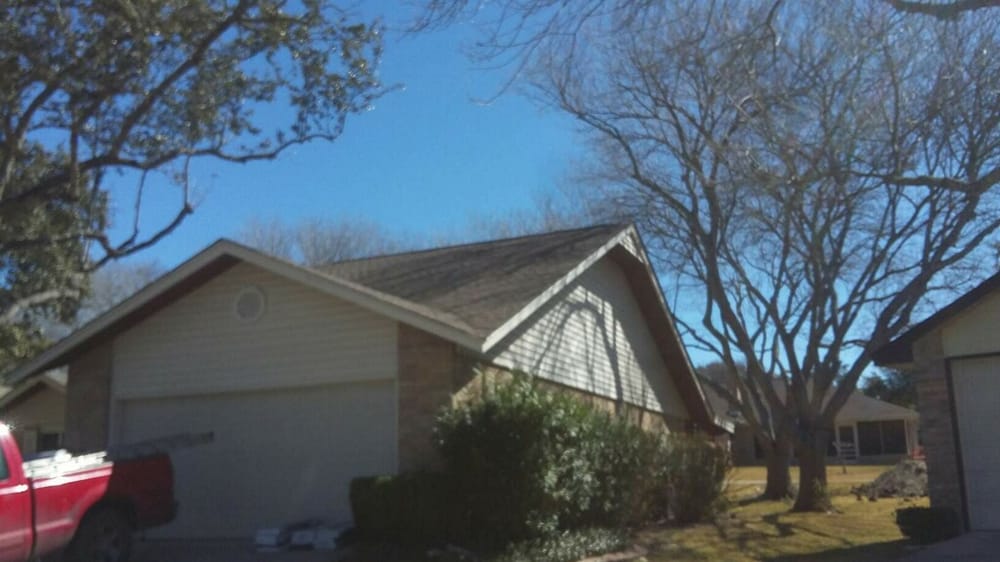 Slide of Tim's Roofing