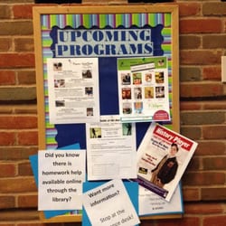 Grand Rapids Area Library - Bulletin Board displaying upcoming programs at the library.