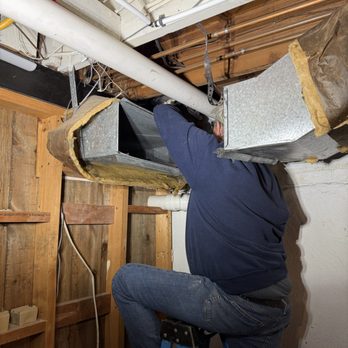 Serenity Plumbing - Technician reinstalling 3" PVC drain line in basement ceiling - Plumbing Near Me - Midlothian, Virginia Serenity Plumbing - Technician reinstalling 3" PVC drain line in basement ceiling - Plumbing Near Me - Midlothian, Virginia