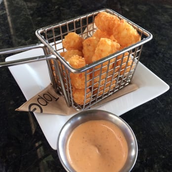 Topgolf - Tots with sauce. Sauce was tasty - Golf Near Me - Dallas, Texas Topgolf - Tots with sauce. Sauce was tasty - Golf Near Me - Dallas, Texas