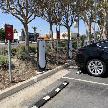 Tesla Supercharger - Tesla chargers are located in the Stonewood Center mall parking lot near Firestone Blvd - Automotive Near Me - Downey, California Tesla Supercharger - Tesla chargers are located in the Stonewood Center mall parking lot near Firestone Blvd - Automotive Near Me - Downey, California
