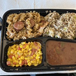 The Big Easy: jambalaya, dirty rice, corn maque choux, and red beans. (spoon for scale) The Big Easy: jambalaya, dirty rice, corn maque choux, and red beans. (spoon for scale)