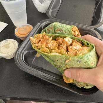 Manhattan Cafe - Build-your-own buffalo chicken wrap on a spinach tortilla with pepper jack cheese, lettuce, jalapeños, and chipotle (crack) spread. - Delis Near Me - Raleigh, North Carolina