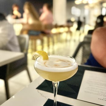 Aja 30A - a cocktail with a lemon garnish - Desserts Near Me - Inlet Beach, Florida Aja 30A - a cocktail with a lemon garnish - Desserts Near Me - Inlet Beach, Florida